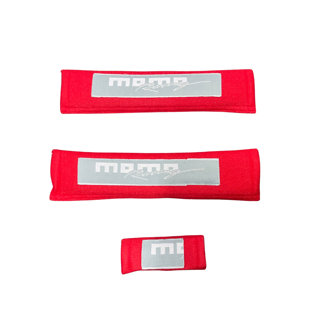protector cinturón momo, funda cinturón auto, accesorio cinturón seguridad, protector acolchado cinturón, momo racing cinturón, comodidad auto momo, cinturón deportivo auto